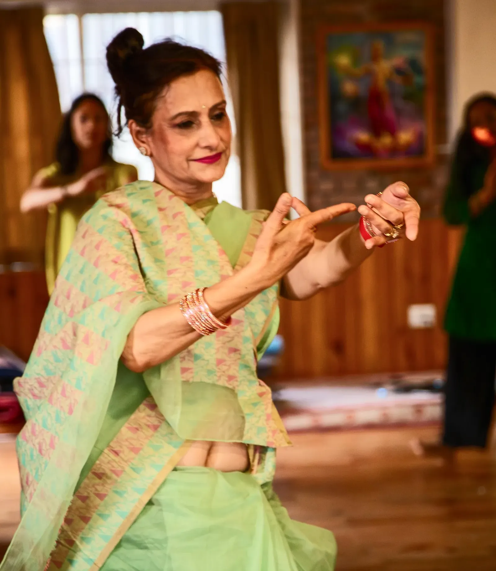 Anupama Dahal demonstrating a Tara Dance hand gesture